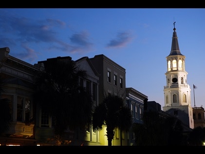 White church steeple illuminated in the night sky, Charleston, South Carolina. 