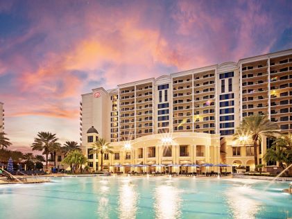 The pool and resort exterior of Parc Soleil, a Hilton Grand Vacations Club, in Orlando, Florida