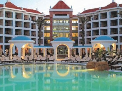 The resort exterior and pool at Vilamoura, a Hilton Grand Vacations Club, in Portugal