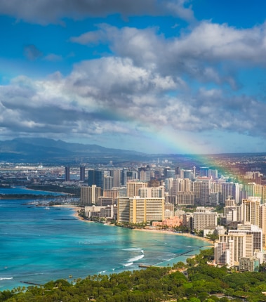 Rainbow over the city by the sea